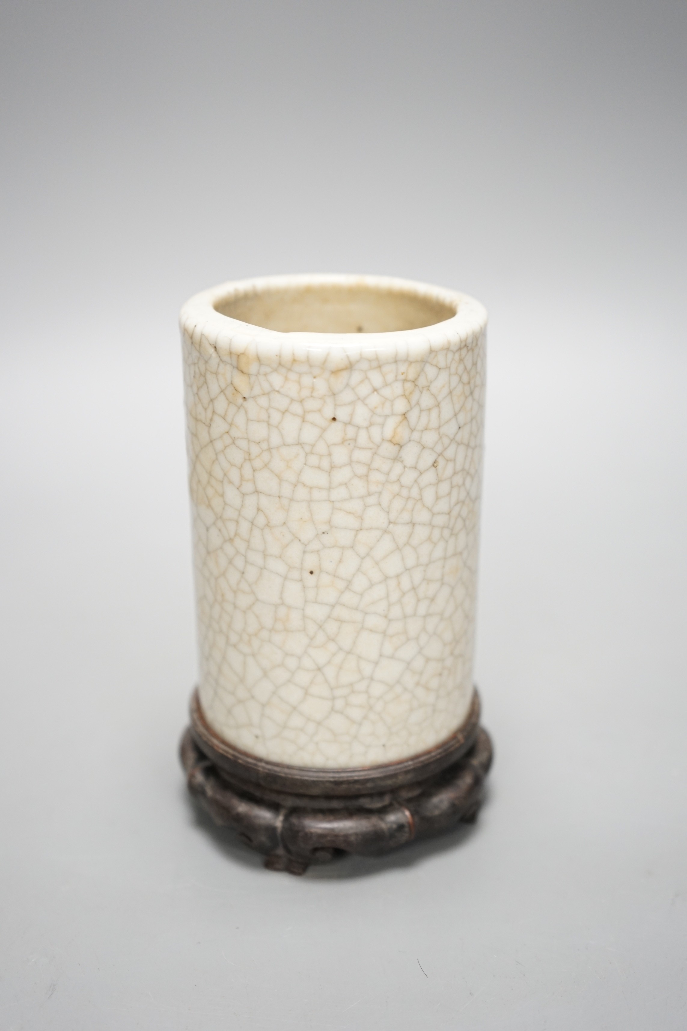A Chinese crackle glaze brushpot, 19th century, wood stand, 14cm total
